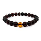 Black amber bracelet with brown amber insert "Honey"