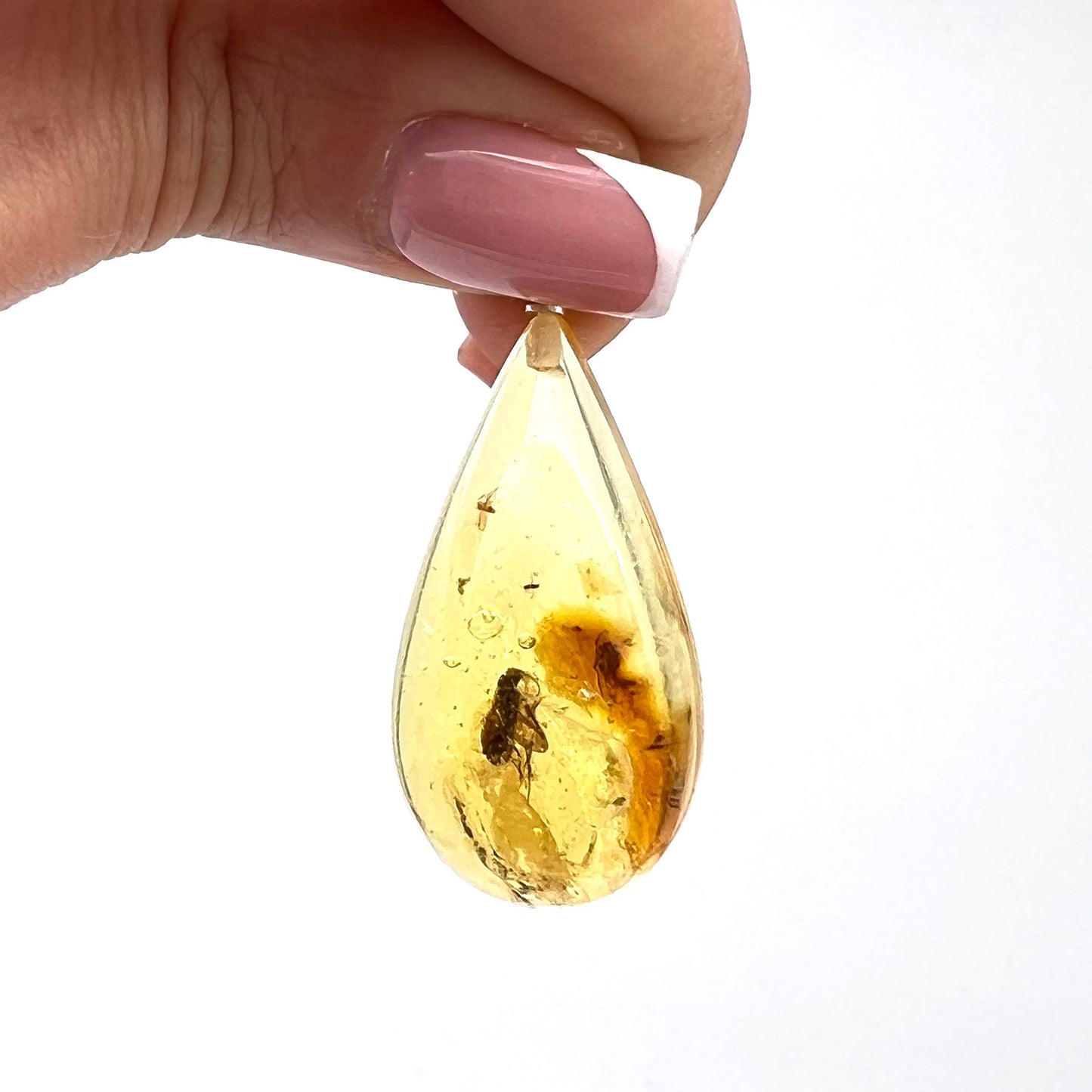 Amber pendant with inclusions "Dance"